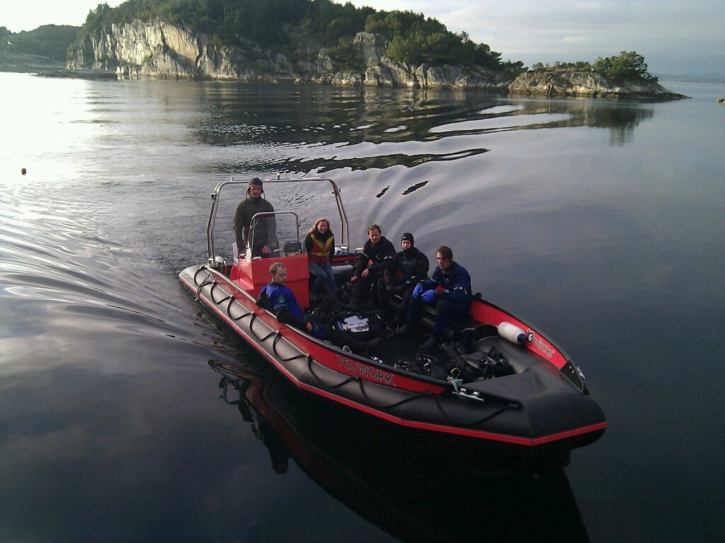 People in the water on a RIB